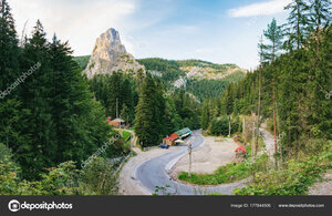 depositphotos_177844506-stock-photo-road-through-carpathians-in-romania.jpg